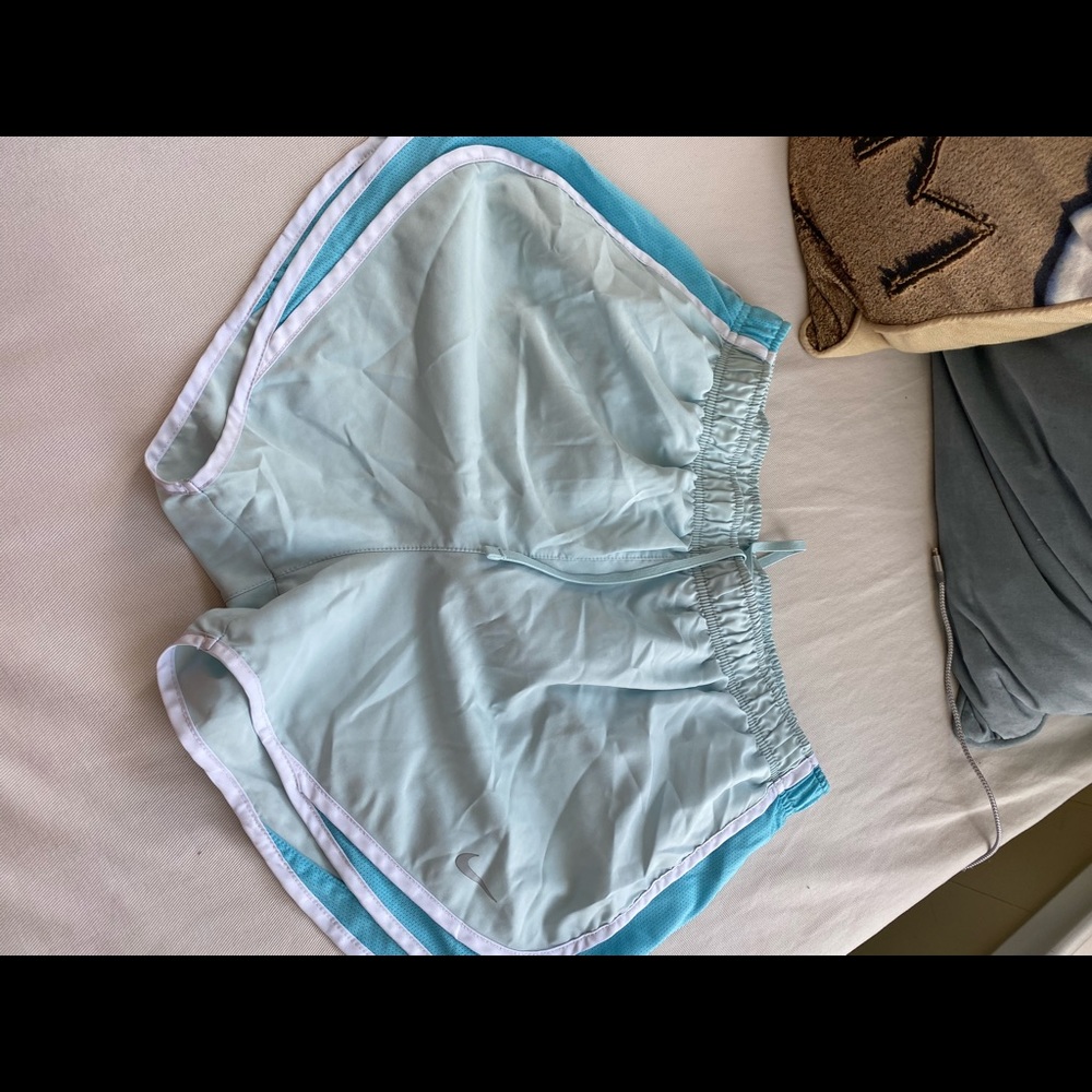 Blue nike two toned running shorts white sides